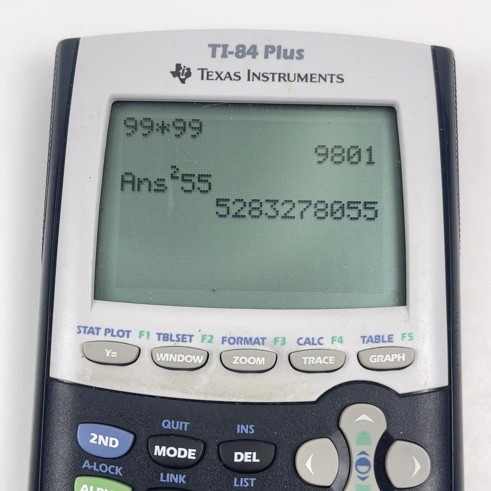 Texas Instruments TI-84 Plus Graphing Calculator w/Manual Tested Powers On Read!